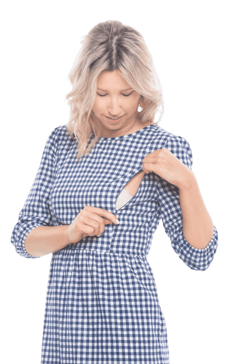 Model facing camera wearing blue gingham, mid-length sleeved midi dress, features rounded neckline, tiered skirt and pockets. Dorothy available in sizes 6-18