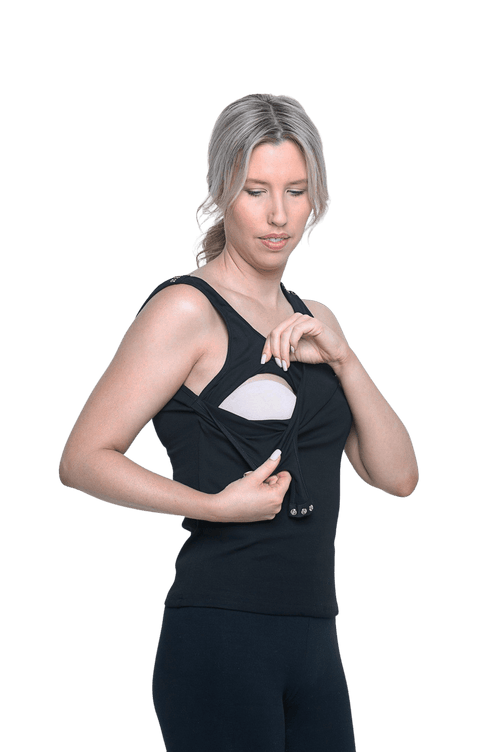 Petite model facing camera wearing black, tank top, features rounded neckline. Drew available in sizes 6-26