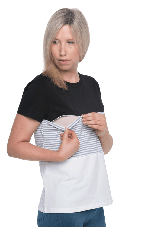 Petite model facing camera wearing colour blocked, short sleeved tee. Colour block is black in top third, grey & white stripe in middle third, white in bottom third. Features rounded neckline. Jamie available in sizes 6-26