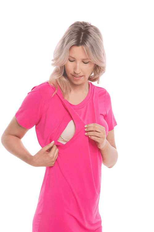 Blonde model facing camera wearing hot pink mid thigh length nightie, featuring rounded neckline, scooped hemline with short sleeves. Penny available in sizes 6-18