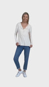 Model wearing sand, long sleeved henley top. Features button front and dropped shoulder. Hunter available in sizes 6-26