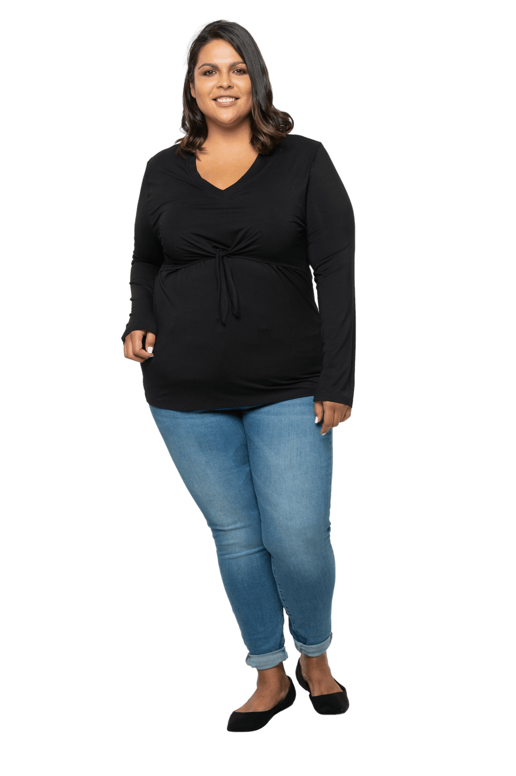 Curvy model facing camera wearing black, long sleeved, v-neck top, features small tie front under bust. Billie available in sizes 6-26