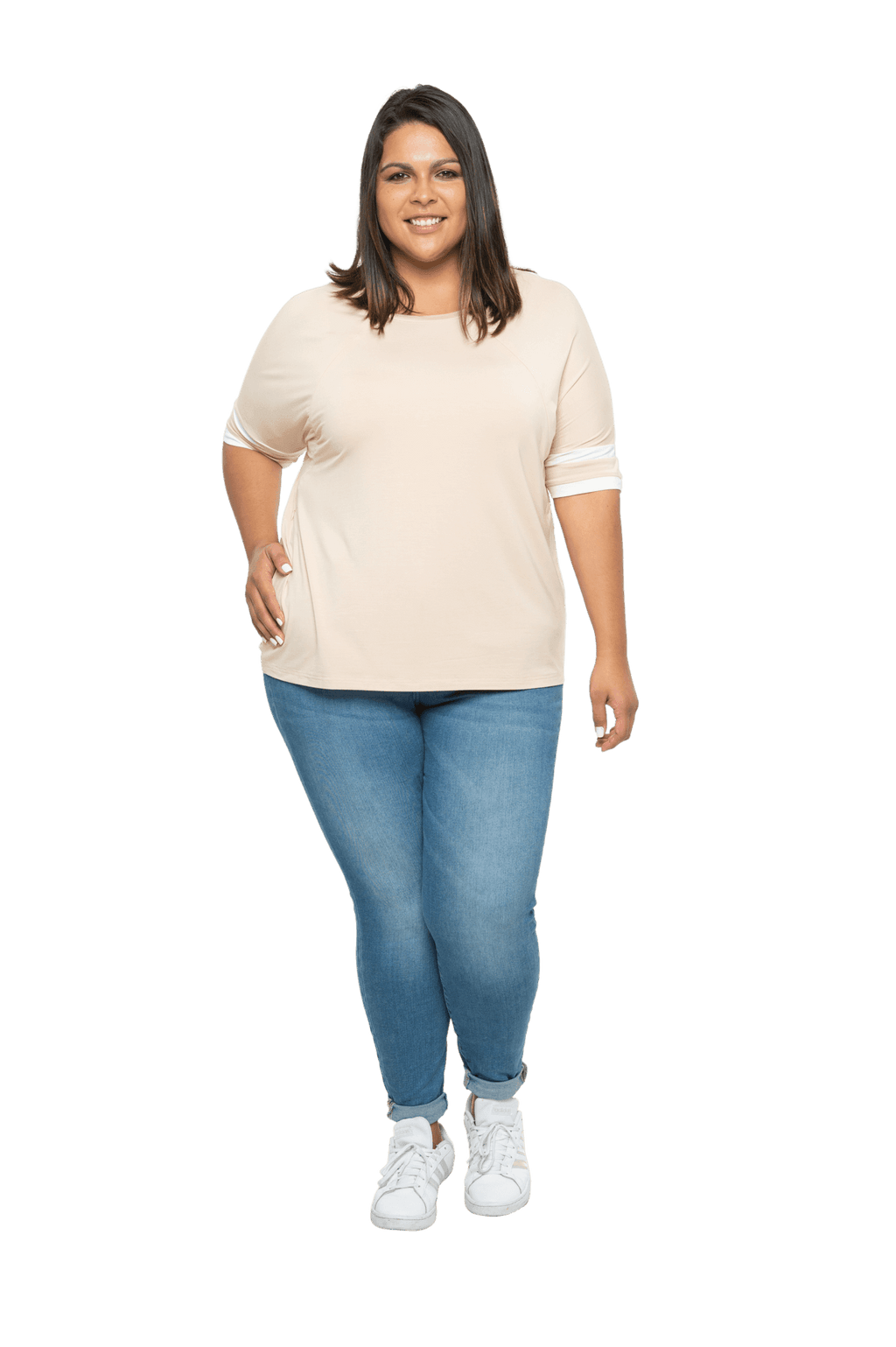 Curvy model facing camera wearing sand, short sleeved, relaxed fit top, features rounded neckline and two white varsity stripes on the sleeve. Cameron available in sizes 6-26
