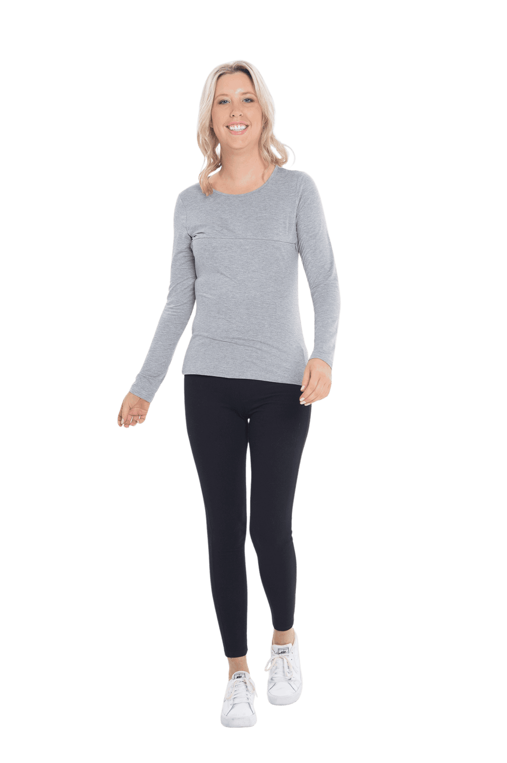 Petite model facing camera wearing grey, long sleeved tee, features rounded neckline. Cindy available in sizes 6-26