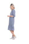 Model facing the side wearing blue gingham, mid-length sleeved midi dress, features rounded neckline, tiered skirt and pockets. Dorothy available in sizes 6-18