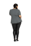 Curvy model facing the back wearing charcoal grey short sleeved top. Featuring rounded neckline and peplum tier under bust. Isla available in sizes 6-26