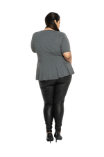 Curvy model facing the back wearing charcoal grey short sleeved top. Featuring rounded neckline and peplum tier under bust. Isla available in sizes 6-26