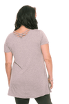 Model facing the back wearing grey, short sleeved top. Showing criss cross design below neckline. Jade available in sizes 6-18