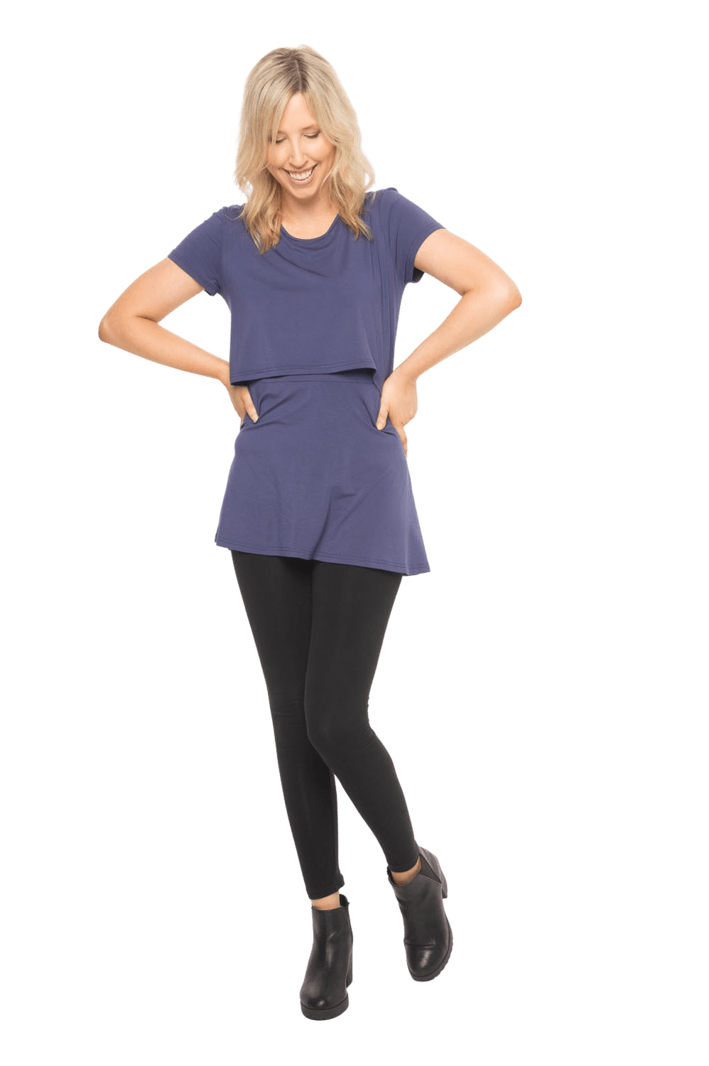 Model facing camera wearing navy blue, short sleeved top. Features rounded neckline. Jade available in sizes 6-18
