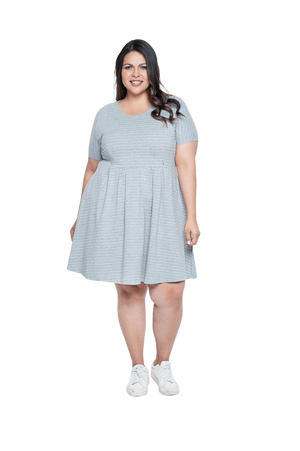 Curvy model facing camera wearing grey with white pin striped, knee length dress, featuring rounded neckline, fitted bodice, pleated A-line skirt and pockets. Kaitlyn available in sizes 6-26