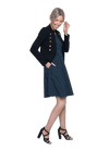 Petite model facing the side wearing navy with white pin striped, knee length dress and black blazer, featuring rounded neckline, fitted bodice, pleated A-line skirt and pockets. Kaitlyn available in sizes 6-26