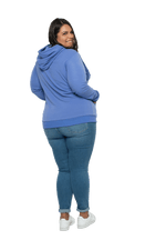 Curvy model facing the back looking over her shoulder wearing cornflour blue hoodie, featuring front pocket, and white Mama print across the chest. Mama hoodie available in sizes 6-26