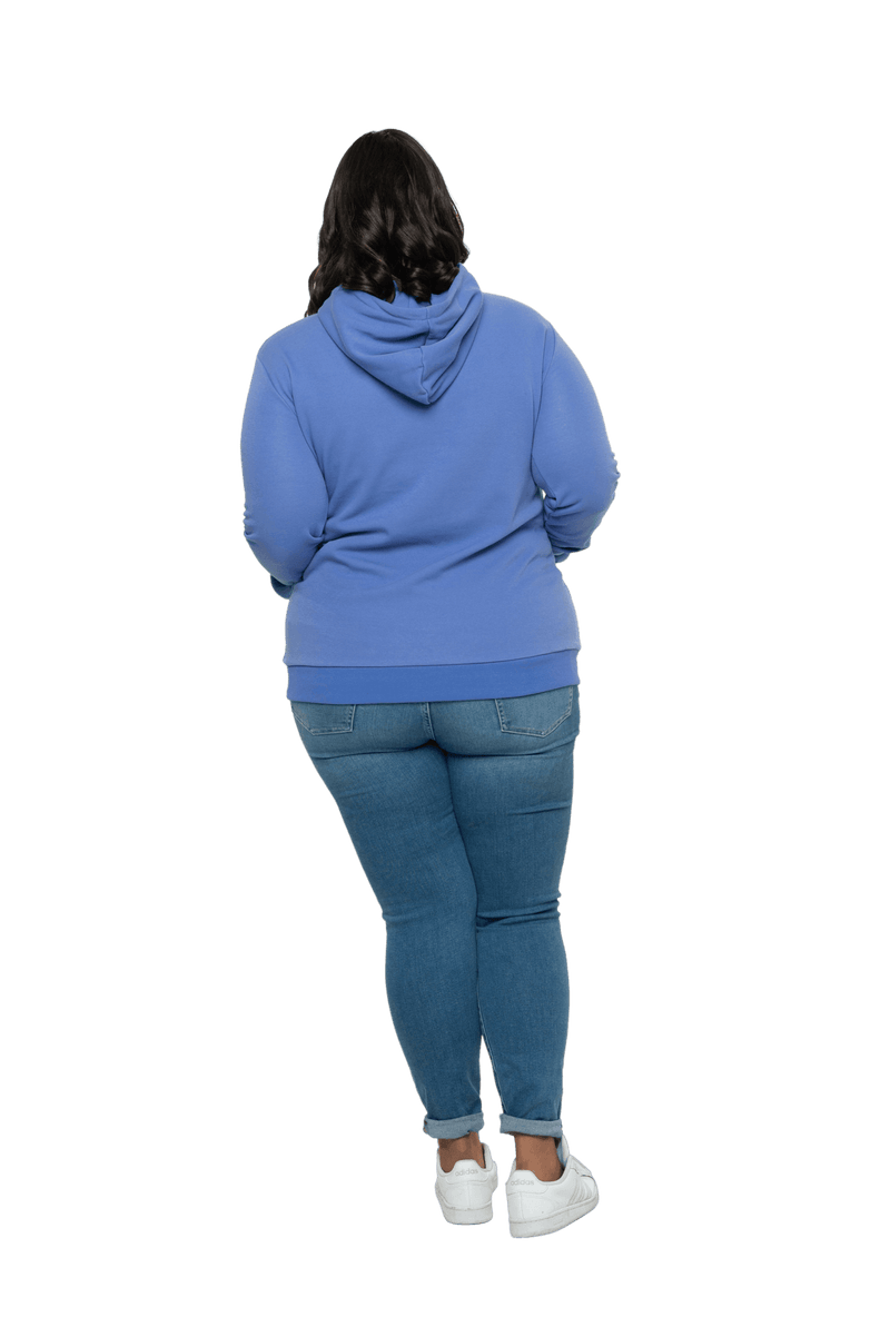 Curvy model facing the back wearing cornflour blue hoodie, featuring front pocket, and white Mama print across the chest. Mama hoodie available in sizes 6-26