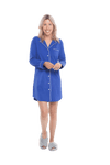 Petite model facing camera wearing royal blue button up, mid thigh length pyjama shirt, featuring fold over collar, scooped hemline, and white piping. Parker available in sizes 6-18