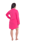 Brunette model facing the back wearing royal blue button up, mid thigh length pyjama shirt, featuring fold over collar, scooped hemline, and white piping. Parker available in sizes 6-18