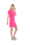 Blonde model facing the side wearing hot pink mid thigh length nightie, featuring rounded neckline, scooped hemline with short sleeves. Penny available in sizes 6-18