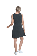 Petite model facing the back wearing charcoal grey mid thigh length dress, featuring rounded neckline, pockets and a waist sash tied at the front. Peyton available in sizes 6-26