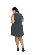 Curvy model facing the back wearing charcoal grey mid thigh length dress, featuring rounded neckline, pockets and a waist sash tied at the front. Peyton available in sizes 6-26