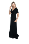 Petite model facing the side wearing black maxi dress, featuring crossover V-neck, double layer detailed sleeves, pockets and a beautiful Grecian flowing silhouette. Phoebe available in sizes 6-26