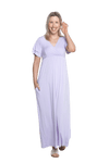 Petite model facing camera wearing lilac maxi dress, featuring crossover V-neck, double layer detailed sleeves, pockets and a beautiful Grecian flowing silhouette. Phoebe available in sizes 6-26