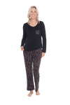 Petite model facing the camera wearing long sleeved pyjamas with pants. Top is black with contrast breast pocket matching pants. Pants are black with small red rose pattern, featuring pockets, and elasticated waist with pull tie. Piper available in sizes 6-26
