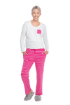 Petite model facing the camera wearing long sleeved pyjamas with pants. Top is white with contrast breast pocket matching pants. Pants are hot pink and white stripe, featuring pockets, and elasticated waist with pull tie. Piper available in sizes 6-18
