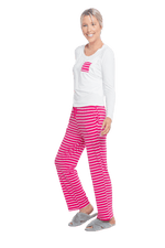 Petite model facing the side wearing long sleeved pyjamas with pants. Top is white with contrast breast pocket matching pants. Pants are hot pink and white stripe, featuring pockets, and elasticated waist with pull tie. Piper available in sizes 6-18