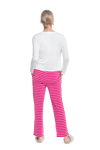 Petite model facing the back wearing long sleeved pyjamas with pants. Top is white with contrast breast pocket matching pants. Pants are hot pink and white stripe, featuring pockets, and elasticated waist with pull tie. Piper available in sizes 6-18