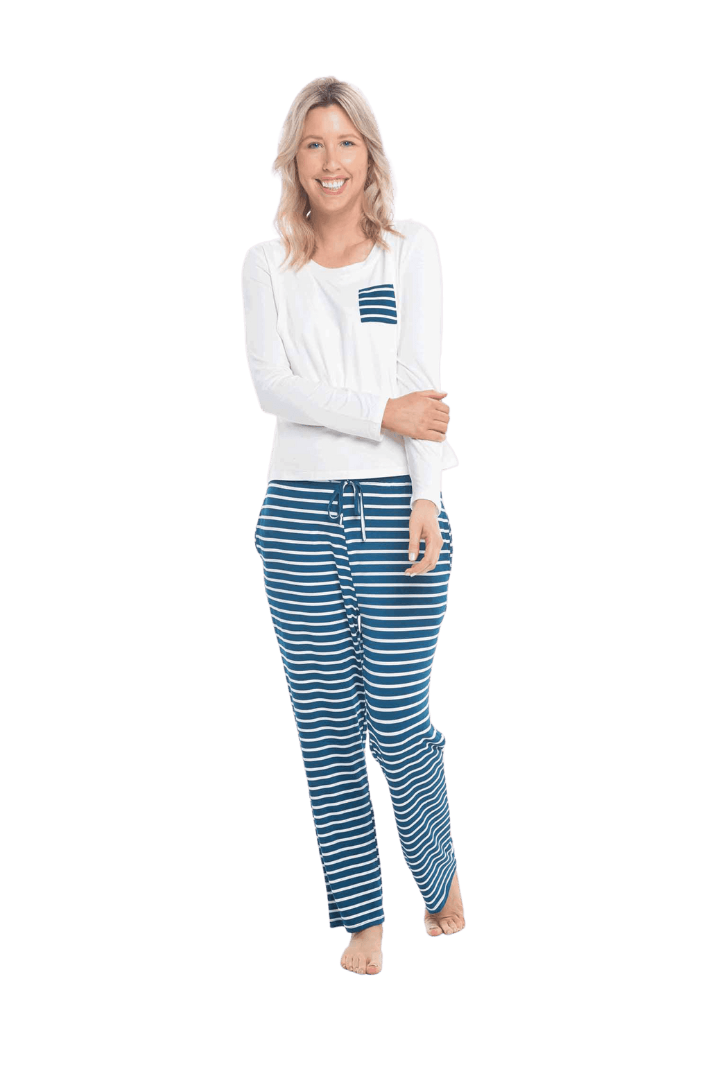 Petite model facing the camera wearing long sleeved pyjamas with pants. Top is white with contrast breast pocket matching pants. Pants are teal and white stripe, featuring pockets, and elasticated waist with pull tie. Piper available in sizes 6-18