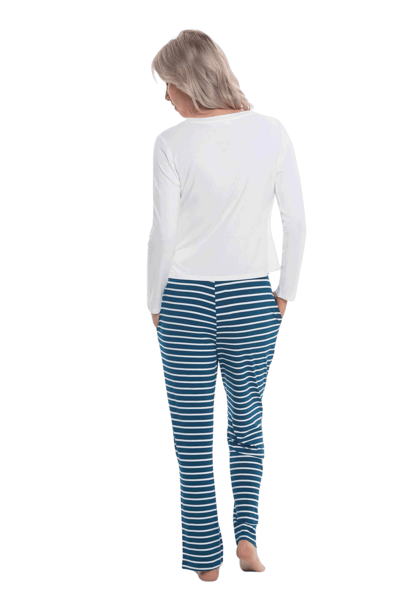 Petite model facing the back wearing long sleeved pyjamas with pants. Top is white with contrast breast pocket matching pants. Pants are teal and white stripe, featuring pockets, and elasticated waist with pull tie. Piper available in sizes 6-18