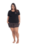 Curvy model facing camera wearing short sleeved pyjamas with shorts. Top is black with contrast breast pocket matching shorts. Shorts are black with small red rose pattern, featuring pockets, and elasticated waist with pull tie. Poppy available in sizes 6-26