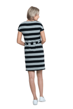 Petite model facing the back wearing charcoal grey and black striped t-shirt dress, featuring rounded neckline, pockets, belt feature, and capped sleeves. Quinn available in sizes 6-26