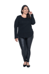 Curvy model facing camera wearing black long sleeved top, featuring soft V-neck and a scooped hem. Reese available in sizes 6-26
