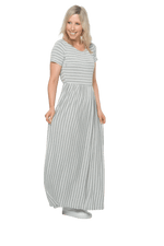 Petite model facing the side wearing light grey and white striped maxi dress, featuring rounded neckline, and a gently fitted bodice, gathering above the waist. Riley available in sizes 6-18