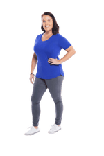 Petite model facing the side wearing cobalt blue short sleeved tee, featuring rounded neckline, and scooped hem. Stevie available in sizes 6-18