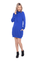 Petite model facing the camera wearing cobalt blue long sleeved tunic as a dress with boots, featuring pockets and a faux hoodie collar in a comfy, relaxed fit. Tori available in sizes 6-18