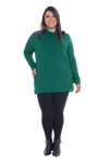 Curvy model facing the camera wearing bottle green long sleeved tunic as a top with black pants, featuring pockets and a faux hoodie collar in a comfy, relaxed fit. Tori available in sizes 6-26