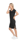Petite model facing the side wearing black with white pin striped shift dress, featuring slight v neck and side splits. Zoe available in sizes 6-18