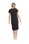 Petite model facing the back wearing black with white pin striped shift dress, featuring slight v neck and side splits. Zoe available in sizes 6-18
